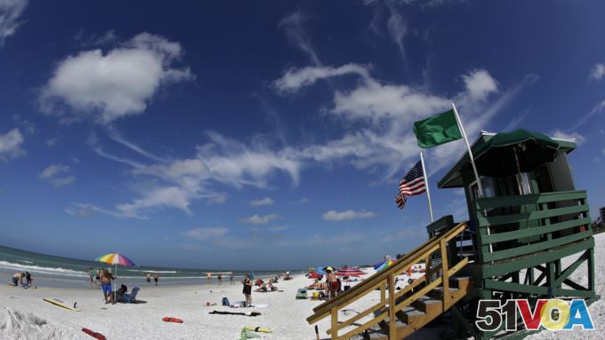 This May 18, 2017 photo shows Siesta Beach on Siesta Key in Sarasota, Florida. (AP Photo, Chris O'Meara)