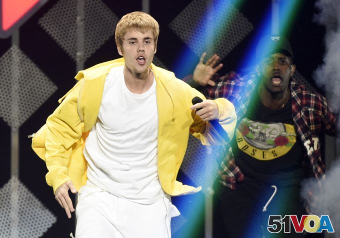 FILE - Justin Bieber performs at the 2016 Jingle Ball at Staples Center in Los Angeles.