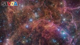 An undated image shows a view of the orange and pink clouds that make up what remains after the explosive death of a massive star - the Vela supernova remnant. (ESO/VPHAS+ team/Cambridge Astronomical Survey Unit/Handout via REUTERS )
