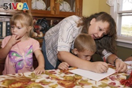 This mother in Iowa is homeschooling her children. To 