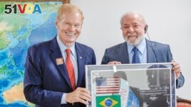 NASA Administrator Bill Nelson and Brazil's<I>&#</i>160;President<i>&#</i>160;Luiz Inacio<i>&#</i>160;Lula<i>&#</i>160;da Silva pose for picture during a meeting at the Planalto Palace in Brasilia, Brazil July 24, 2023. (Brazilian Presidency/Handout via REUTERS)