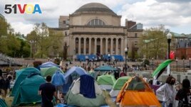 Students and other protesters are in a tent camp on the campus of Columbia University in New York on Wednesday, April 24, 2024. Students are demanding that colleges end investments supporting Israel's war in Gaza. (AP Photo/Ted Shaffrey)