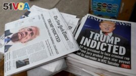 New York newspapers are displayed at a newsstand following former U.S. President Donald Trump's indictment by a Manhattan grand jury following a probe into hush money paid to porn star Stormy Daniels, in New York, March 31, 2023. (REUTERS/Mike Segar)