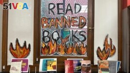 FILE - A Banned Books Week display is at the Mott Haven branch of the New York Public Library in the Bronx borough of New York City on Saturday, October 7, 2023. (AP Photo/Ted Shaffrey)