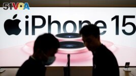 FILE - An Apple iPhone 15 advertisement is seen as it officially goes on sale across China at an Apple Store in Shanghai, China September 22, 2023. (REUTERS/Aly Song)