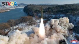 A ballistic missile, said to be solid-fuel and hypersonic, launches during a test at an unspecified location in North Korea in this picture released by the Korean Central News Agency on January 14, 2024. (KCNA via REUTERS)