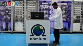 An engineer works at the Ohmium manufacturing facility in Chikkaballapur, India, Tuesday, April 25, 2023. The company announced April 26, 2023 it has raised $250 million to expand production of machines that can make clean hydrogen and displace fossil fuels. (AP Photo/Aijaz Rahi)