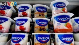 Dannon yogurt sits on display in a market in Pittsburgh, Wednesday, Aug. 8, 2018. (AP Photo/Gene J. Puskar)