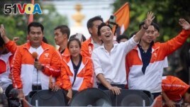 Pita Limjaroenrat, center, leader of Move Forward Party, waves to his supporters, in Bangkok, Monday, May 15, 2023. (AP Photo/Wason Wanichakorn)