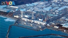 This aerial photo shows the Fukushima Daiichi nuclear power plant in Okuma town, Fukushima prefecture, north of Tokyo, on March 17, 2022. (Shohei Miyano/Kyodo News via AP, File)