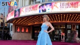 Taylor Swift arrives at the world premiere of the concert film Taylor Swift: The Eras Tour on Wednesday, Oct. 11, 2023, at AMC The Grove 14 in Los Angeles. (AP Photo/Chris Pizzello)