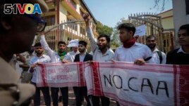 Students protest against the Citizenship Amendment Act (CAA) in Guwahati, India, Tuesday, March 12, 2024. (AP Photo/Anupam Nath)