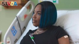 FILE - This July 2019 image provided by the Sarah Cannon Research Institute shows Victoria Gray during a gene-editing trial for sickle cell disease. Gray was the first patient to test the treatment. (Anthem Pictures/Sarah Cannon Research Institute via AP, File)
