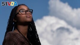Harmony Kennedy, 16, a high school student, poses for a portrait in Nolensville, Tenn., on Tuesday, May 16, 2023. (AP Photo/George Walker IV)