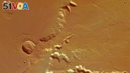 This high-resolution image, taken by a camera aboard ESA's Mars Express spacecraft, shows part of the Medusa Fossae formation and surrounding areas near the equator of Mars. (ESA/DLR/FU Berlin (G. Neukum))