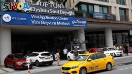 FILE - A visa application center of VFS Global is seen in Istanbul, Turkey, Aug. 25, 2022. 
