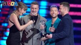 Joey Fatone, from center, Lance Bass, and Justin Timberlake of NSYNC present the award for best pop to Taylor Swift, far left, for Anti-Hero during the MTV Video Music Awards on September 12, 2023, at the Prudential Center in Newark, N.J. (Photo by Charles Sykes/Invision/AP)