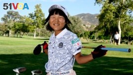 Miroku Suto of Japan poses for a portrait after the final round at the Junior World Championships golf tournament held at Singing Hills Golf Resort on Thursday, July 14, 2022, in El Cajon, Calif. (AP Photo/Denis Poroy)