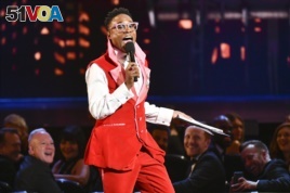 FILE - This June 9, 2019 file photo shows Billy Porter speaking at the Tony Awards in New York. Porter's outfit was made from curtains from the Tony Award-winning musical 