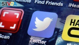 FILE - A Twitter app on an iPhone screen is shown.