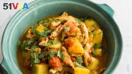 This image released by Milk Street shows a recipe for Cape Malay Chicken Curry. (Milk Street via AP)