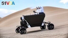 A handout image shows a prototype of California startup Astrolab 's Flex rover, that will be able to be operated directly by astronauts on the moon. The rover was tested in Death Valley National Park at the Dumont Dunes in December, 2021. (ASTROLAB/Handout)