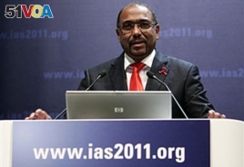 Michel Sidibe, head of the United Nations AIDS agency, speaks in Rome at a conference on HIV/AIDS