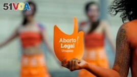 FILE - Pro-abortion activists protest in front of the Uruguayan Congress in Montevideo, Uruguay, Tuesday, Sept. 25, 2012. In 2022, in Uruguay, abortion is permitted on-demand. (AP Photo/Matilde Campodonico, File)