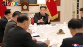 North Korean leader Kim Jong Un presides over a politburo meeting of the ruling Workers' Party, amid the COVID-19 pandemic, in Pyongyang, North Korea, May 17, 2022, in this photo released by North Korea's Korean Central News Agency (KCNA).