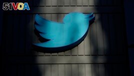 FILE - A sign at Twitter headquarters is shown in San Francisco, Friday, Nov. 18, 2022. (AP Photo/Jeff Chiu)