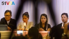 Than Zaw Aung (R), a lawyer of two Reuters journalists, holds a press briefing with Pan Ei Mon (2nd-L), wife of Reuters journalist Wa Lone, Chit Su Win (2nd-R), wife of Reuters journalist Kyaw Soe Oo, and Khin Maung Zaw (L), a lawyer of two Reuters journa
