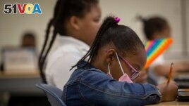 Students work in a classroom at Beecher Hills Elementary School on Friday, Aug. 19, 2022, in Atlanta. (AP Photo/Ron Harris)