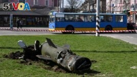 A part of a Tochka-U missile lies on the ground following an attack at the railway station in Kramatorsk, Ukraine, April 8, 2022. (AP Photo/Andriy Andriyenko)