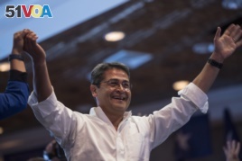 FILE - Honduran President Juan Orlando Hernandez