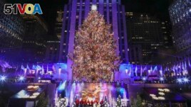 The Christmas Tree in Rockefeller Plaza is seen during the Lighting ceremony in New York City on November 30, 2022. (Photo by KENA BETANCUR / AFP)