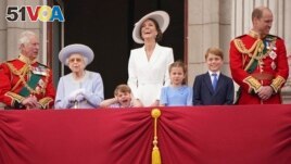 From left, Prince Charles, Queen Elizabeth II, Prince Louis, Kate, Duchess of Cambridge, Princess Charlotte, Prince George and Prince William gather on the balcony of Buckingham Palace June 2, 2022. (Jonathan Brady/Pool Photo via AP)