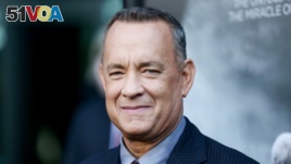 Tom Hanks bumped into a couple taking wedding photos in New York City.