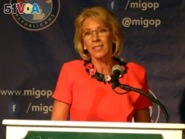 Betsy DeVos speaks Friday during a Republican conference in Michigan.