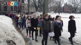 Hundreds of Brown University students march across campus, Wednesday, March 11, 2015, in Providence, R.I., to protest how the college handled recent sexual assault allegations. (AP Photo/Amy Anthony)
