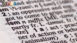 FILE - Merriam-Webster's Collegiate Dictionary showing the suffix -ism. (Richard Drew, AP)