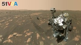 FILE - NASA's Perseverance Mars rover took a 'selfie' with the Ingenuity helicopter on April 8, 2021, seen here about 13 feet (3.9 meters) from the rover. (Image Credit: NASA/JPL-Caltech/MSSS)