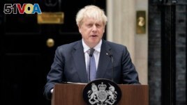 British Prime Minister Boris Johnson speaks to media next to 10 Downing Street in London, Thursday, July 7, 2022. (AP Photo/Alberto Pezzali)