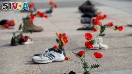 Shoes with flowers are a demonstration against the speech of Seyyed Ali Reza Avai, Minister of Justice of Iran, at the Human Rights Council in Geneva, Switzerland. (File)