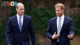 FILE - In a new book, Britain's Prince Harry says he was forced to the ground in a fight with his brother William. (Yui Mok/Pool Photo via AP, File)