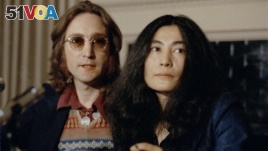 John Lennon and his wife Yoko Ono speak at a press conference, March 2, 1973, in New York. (AP Photo)