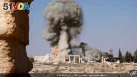 An image distributed by Islamic State militants on social media on August 25, 2015 purports to show the destruction of a Roman-era temple in the ancient Syrian city of Palmyra.