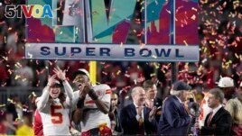 FILE - Kansas City Chiefs players and staff celebrate after the NFL Super Bowl 57 football game against the Philadelphia Eagles, February 12, 2023, in Glendale, Arizona. (AP Photo/Seth Wenig)