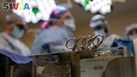 FILE - Instruments sit on a table in an operating room June 15, 2023, in Jackson, Tenn.(AP Photo/Mark Humphrey, File)