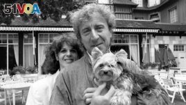 FILE - Actor and director Gene Wilder poses with his wife Gilda Radner, during the 10th American Film Festival of Deauville, France, Sept. 7, 1984.