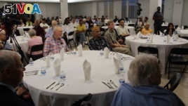 Muslims around the world are observing the holy month Ramadan, which includes fasting from sunrise to sunset. At the Bait-ur-Rehman Mosque in Silver Spring, Maryland, about 200 people gathered for an after-sunset iftar dinner. (Courtesy - Bait-ur-Rehman Mosque)